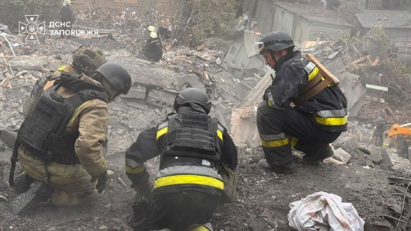Rescuers on the rubble