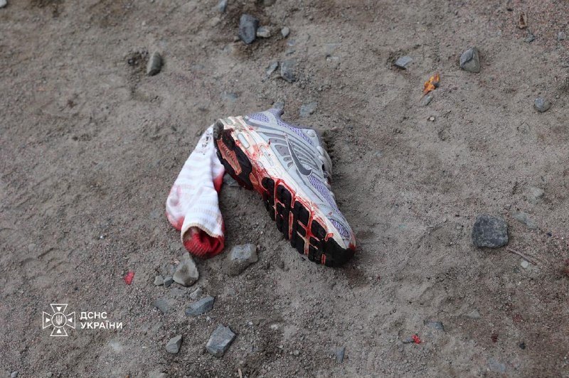 A child's shoe at the strike site, 14 Oct