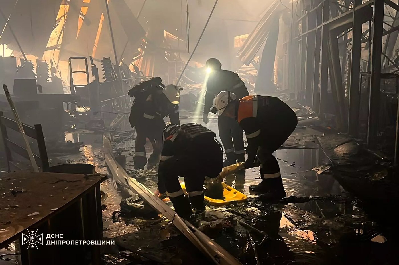 Rescuers searching inside the building