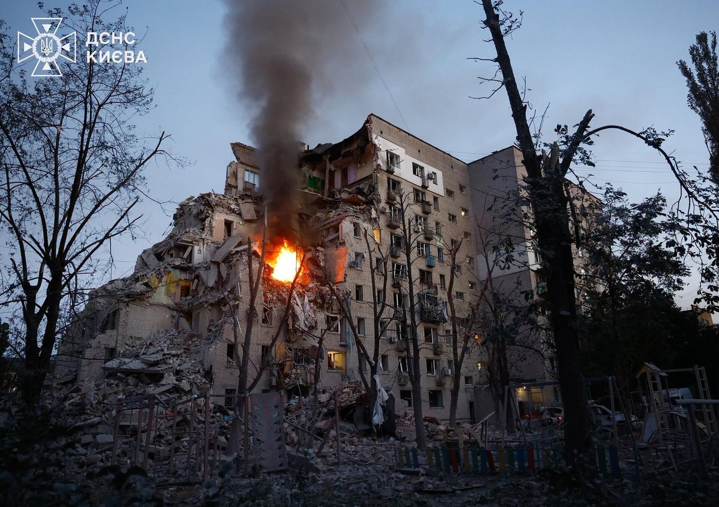 An apartment building burning in Kyiv on the night of 2 July 2026