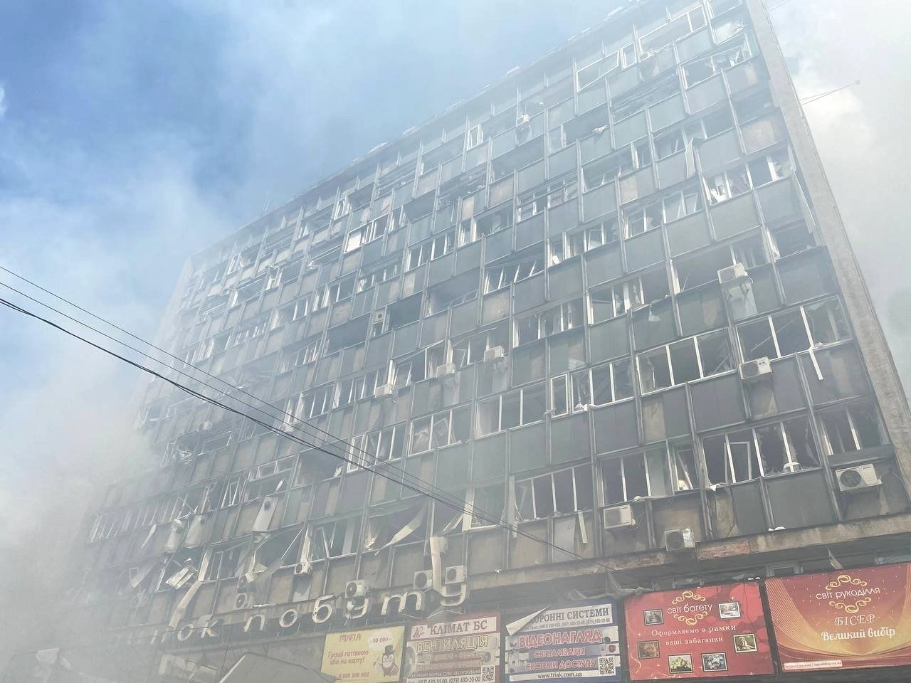 The office block opposite, its windows blown out