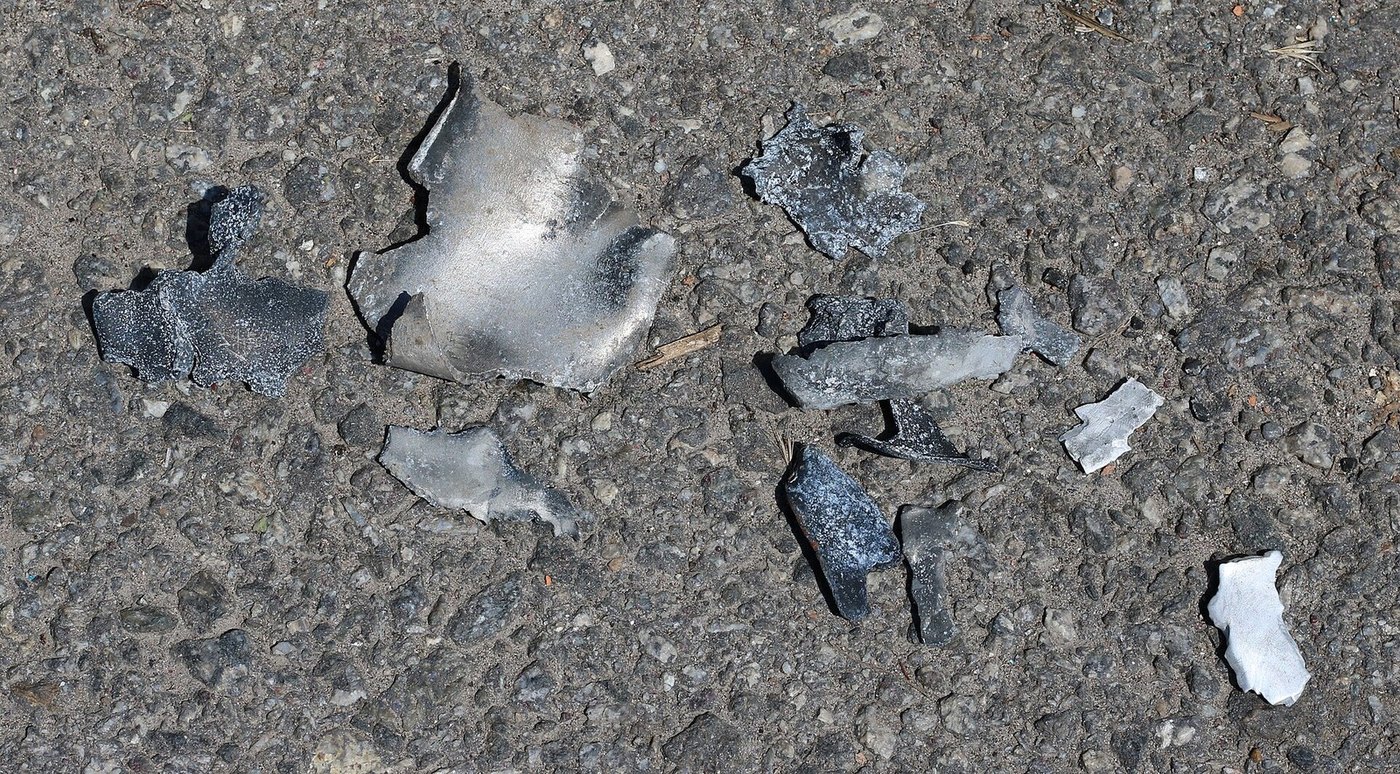 Missile fragments on the pavement