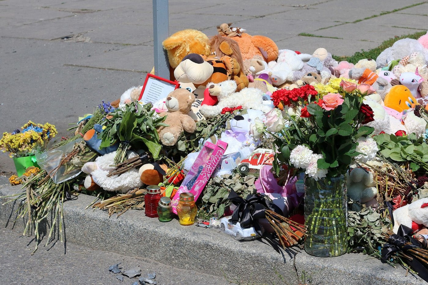 Flowers and toys at the site