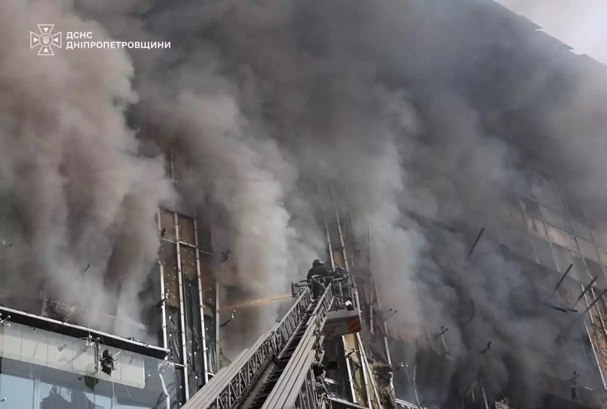 Dnipro, 28 September: firefighters at the burning office building in the city centre